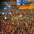 supporters of the Civil Initiative "For United Macedonia" protesting while European Commissioner for enlargement and Negotiations Johannes Hahn (not pictured) is meeting political leaders on March 21, 2017