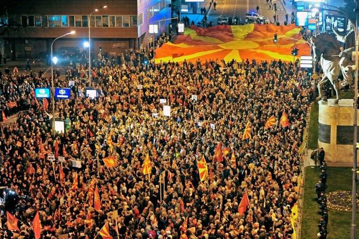 supporters of the Civil Initiative "For United Macedonia" protesting while European Commissioner for enlargement and Negotiations Johannes Hahn (not pictured) is meeting political leaders on March 21, 2017