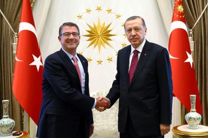 Turkish President Recep Tayyip Erdogan (right) shaking hands with US Secretary of Defence Ashton Carter before a meeting in Ankara, on October 21, 2016
