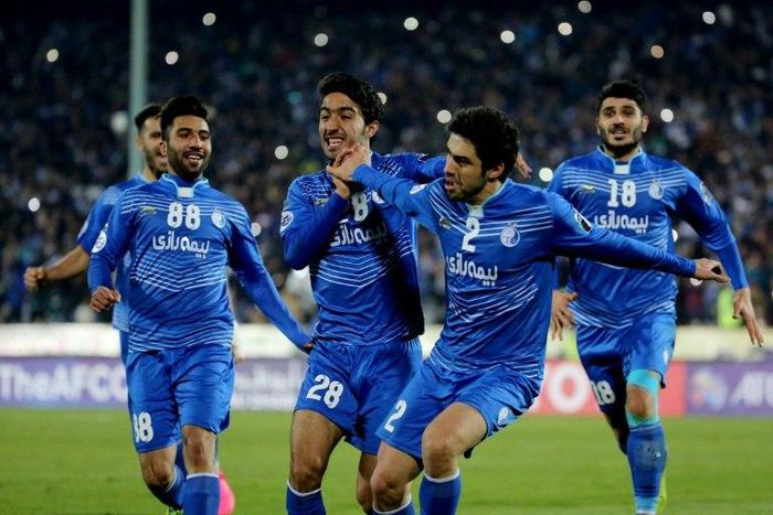 Iran's Esteghlal FC players celebrate after winning their AFC Champions League match against Qatar's Al-Sadd, at the Azadi stadium in Tehran, on February 7, 2017