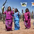 Indigenous people from the Tohono O'odham ethnic group dance and sing to protest against US President Donald Trump's intention to build a new wall in the border between Mexico and United States, in the Altar desert, northern Mexico