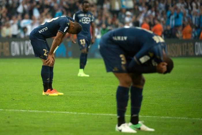 Bastia's players react at the final whistle of the French L1 football match between Marseille and Bastia on May 20, 2017, at the Velodrome stadium in Marseille, southern France