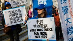 The trial of seven Hong Kong police officers attracted groups of pro- and anti-police demonstrators