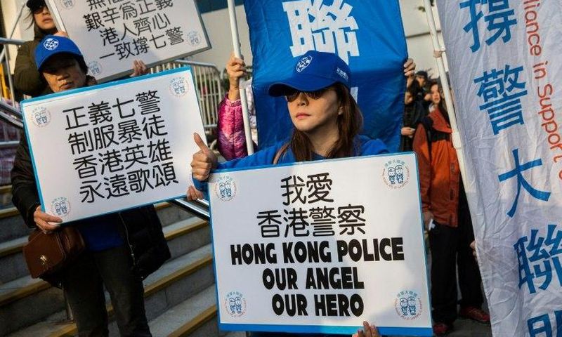The trial of seven Hong Kong police officers attracted groups of pro- and anti-police demonstrators