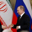 Russian President Vladimir Putin (R) shakes hands with his Iranian counterpart Hassan Rouhani during a joint press conference following their meeting at the Kremlin in Moscow on March 28, 2017