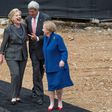 Then US Secretary of State John Kerry (C) talks with former US Secretaries of State Hillary Clinton (L) and Madeleine Albright (R) after breaking ground at the US Diplomacy Center at the US State Department in Washington, DC, September 3, 2014