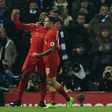 Liverpool's midfielder Georginio Wijnaldum (L) celebrates scoring against Chelsea with midfielder Philippe Coutinho at Anfield on January 31, 2017