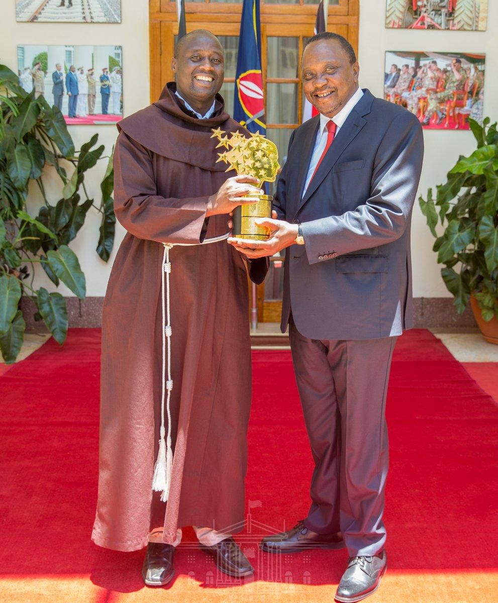 President Kenyatta with teacher Peter Tabichi