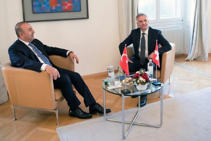 Turkish Foreign Minister Mevlut Cavusoglu (L) meets with Swiss Federal Councillor Didier Burkhalter (R) on March 23, 2017 in Bern, Switzerland