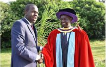 Reuben Kiborek (L) charged in court for defiling CS Chelugui's 16-year old daughter