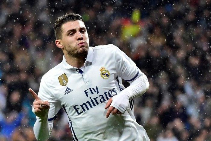 Real Madrid's Croatian midfielder Luka Modric celebrates after scoring a goal during the Spanish league football match Real Madrid CF vs Real Sociedad at the Santiago Bernabeu stadium in Madrid on January 29, 2017