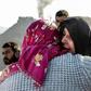 Families of trapped miners console each other at the accident site at a copper mine in Siirt, southeast Turkey on November 18, 2016