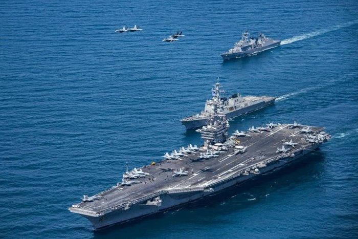 Earlier this month naval exercises were conducted in the Sea of Japan (East Sea) by the aircraft carrier USS Carl Vinson (pictured), with South Korean and Japanese aircraft also taking part