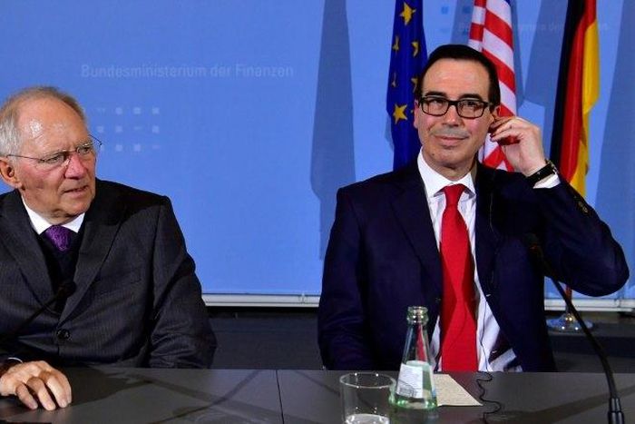 German Finance Minister Wolfgang Schaeuble (L) and US Secretary of the Treasury Steven Mnuchin attend a press conference at the finance ministry in Berlin