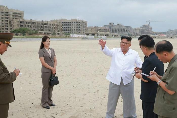 North Korean leader Kim Jong Un (3rd R) visited the resort at least three times last year according to state media