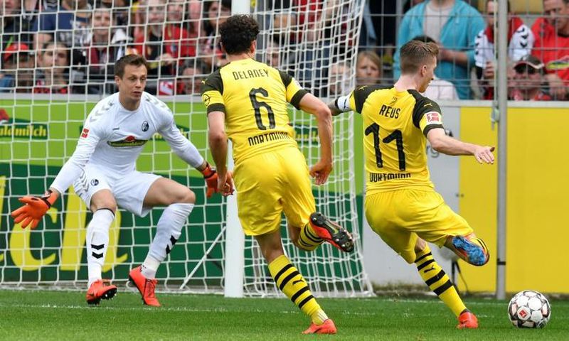 Marco Reus inspired Borussia Dortmund to a crucial win over Freiburg in the Bundesliga on Sunday