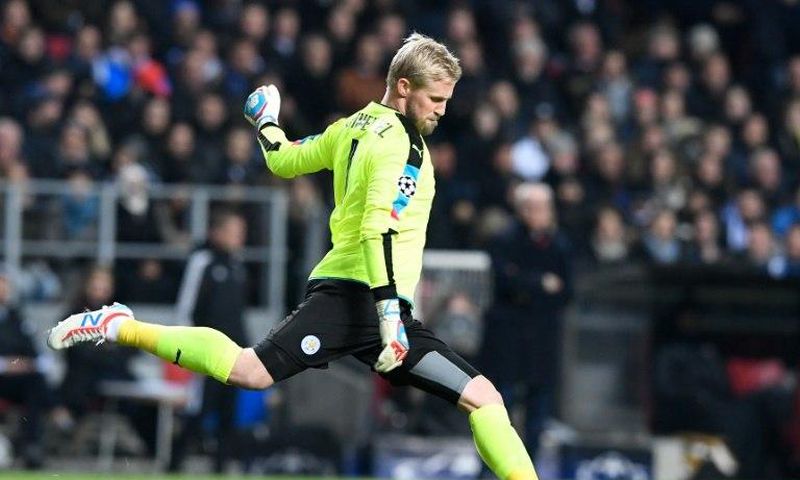 Leicester City's Danish goalkeeper Kasper Schmeichel passes the ballduring the UEFA Champions League group G football match between FC Copenhagen and Leicester City FC at the Telia Parken stadium in Copenhagen on November 2, 2016