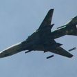 A Syrian Sukhoi SU-17 drops bombs over Jobar district on the eastern outskirts of Damascus on March 20, 2017