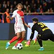 Dortmund's Swiss goalkeeper Roman Burki (R) tries to grab ball from Monaco's French forward Kylian Mbappe during the Champions League quarter-final second leg at the Louis II stadium in Monaco on April 19, 2017