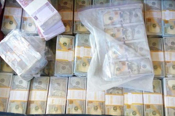 Fake dollars confiscated by DCI in Tuesday morning raid (Twitter)