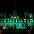 The City Hall of Paris illuminated in green following the announcement by US President Donald Trump that the United States will withdraw from the 2015 Paris accord