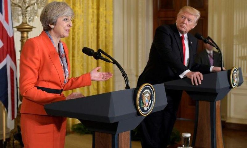 Donald Trump's immigration ban is divisive and wrong, according to Britain's Prime Minister Theresa May