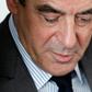 French presidential election candidate for the right-wing Les Republicains (LR) party Francois Fillon looks on during a meeting with the head of France's UDI political party at his campaign headquarters in Paris on March 14, 2017
