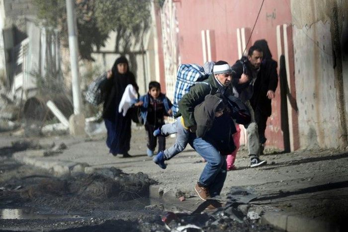 Iraqi civilians were often caught in the crossfire as pro-regime forces fought jihadists for control of east Mosul in November 2016