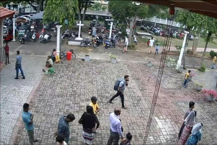 A still taken from Sri Lankan closed-circuit TV shows a suspected suicide bomber wearing a backpack on his way to St Sebastian's Church in Negombo, Sri Lanka, where dozens were killed