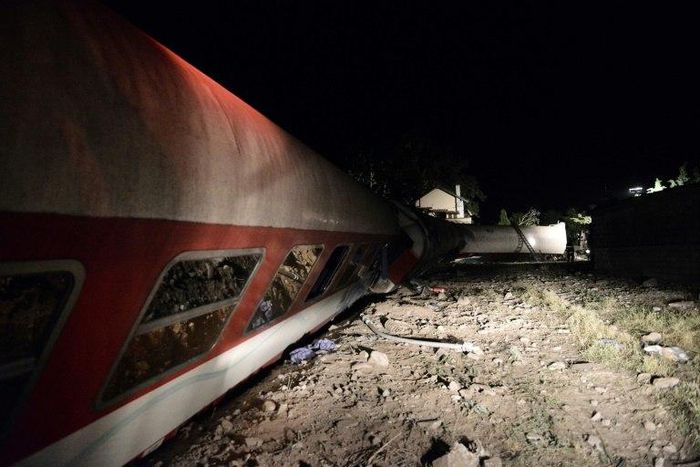 Derailed wagons from a train lie on the ground near the village of Adendro, some 40 km west of Thessaloniki, in northern Greece on May 14, 2017
