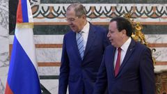 Tunisian Foreign Minister Khemaies Jhinaoui (R) receives visiting Russian Foreign Minister Sergei Lavrov in the capital Tunis on January 26, 2019