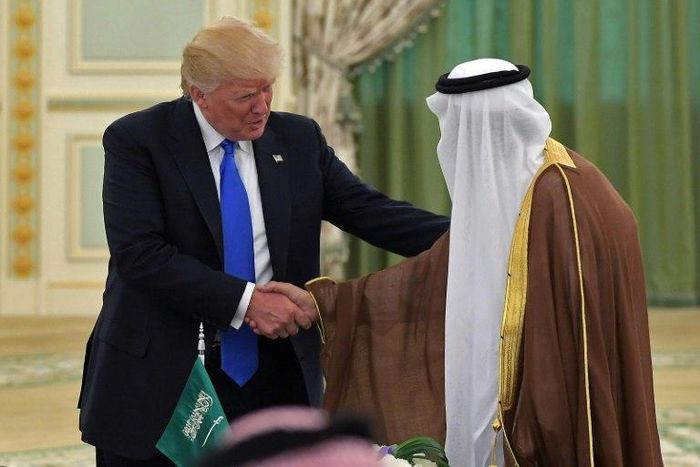 US President Donald Trump (L) shakes hands with Saudi Arabia's King Salman bin Abdulaziz al-Saud during a signing ceremony at the Saudi Royal Court in Riyadh on May 20, 2017
