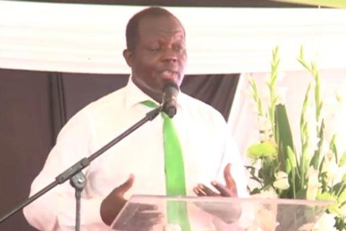 Raphael Tuju speaking in Rarieda during the burial of his brother Kefa Tuju