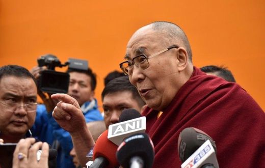 Exiled Tibetan spiritual leader the Dalai Lama speaks to media after delivering religious teachings at the Buddha Stadium in Bomdila in India's north-eastern state of Arunachal Pradesh state