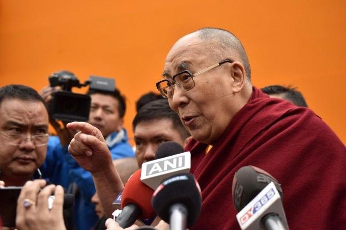 Exiled Tibetan spiritual leader the Dalai Lama speaks to media after delivering religious teachings at the Buddha Stadium in Bomdila in India's north-eastern state of Arunachal Pradesh state