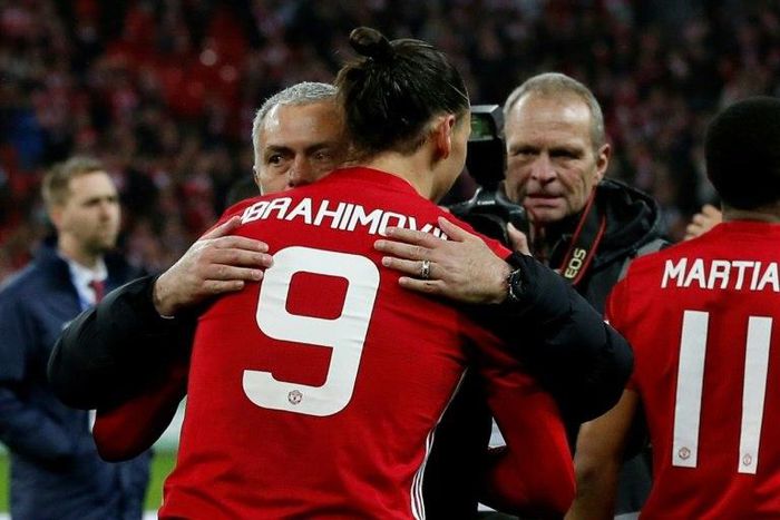Manchester United's Zlatan Ibrahimovic embraces team manager Jose Mourinho after their victory in the English League Cup final match against Southampton, at Wembley stadium in London, on February 26, 2017