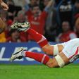Wales' Andy Powell scores a try during the World Cup Rugby Union warm up match between Wales and Argentina on August 20, 2011