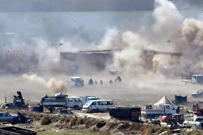 Die-hard Islamic State group fighters are confined to a tiny area on the banks of the Euphrates River in Syria