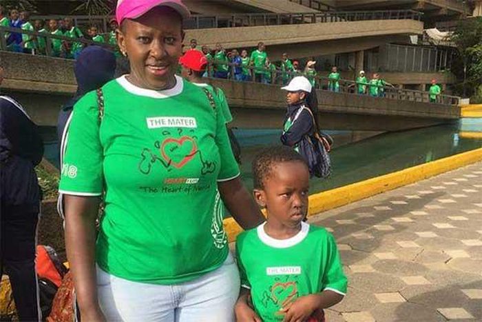 Jerusha Wanjiku with her son Ian Kariuki in a past event in Nairobi (Nation)