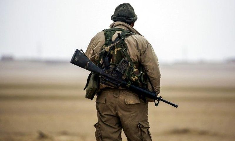 A member of the Syrian Democratic Forces, largely made up of US-backed Kurdish fighters, pictured near the village of Bir Fawaz, 20 km north of Raqa, Syria during their offensive on Islamic State group stronghold on February 8, 2017