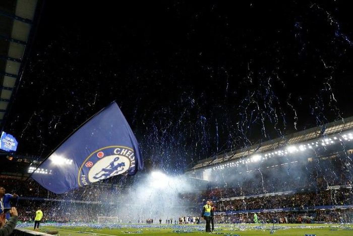Streamers errupt over the pitch at the end of the English Premier League match against Watford at Stamford Bridge