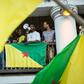 Representatives of the collective "500 freres" announce to a cheering crowd the signing of an agreement with the government in Cayenne, French Guiana on April 21, 2017
