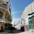 Street artist Banksy opened the Walled-Off Hotel next to Israel's controversial separation wall in Bethlehem on March 3