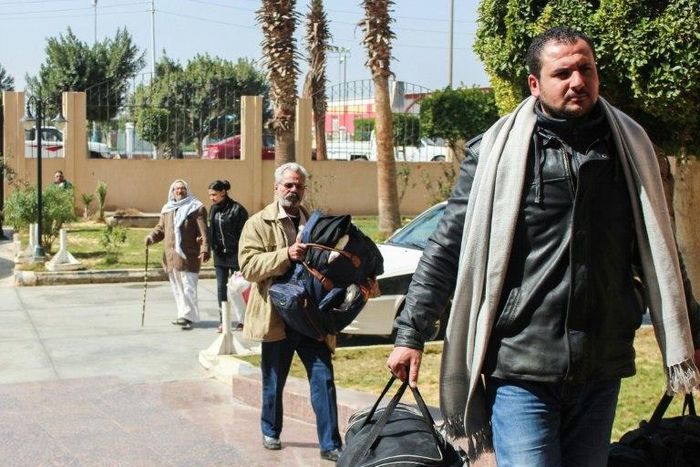 Egyptian Coptic Christians arrive with their belongings to take refuge at the Evangelical Church in the Suez Canal city of Ismailiya on February 25, 2017