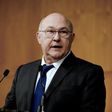 French Economy and Finance Minister Michel Sapin brushes aside US criticism that Germany exploited an "undervalued" euro to fuel its exports