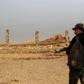 An Iraqi soldier looks at destruction caused by the Islamic State (IS) group at the archaeological site of Nimrud, 30 kilometres south of Mosul, on November 15, 2016, a few days after Iraqi forces retook the ancient city from IS jihadists