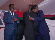 DP William Ruto and Wiper party leader Kalonzo Musyoka embrace during their version of the peace handshake