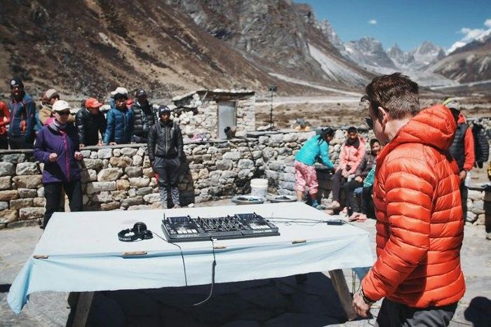 Influential British DJ Paul Oakenfold has reached Mount Everest's base camp where he plans to host the "highest party on earth", performing a set at 5,380 metres (17,600 feet)