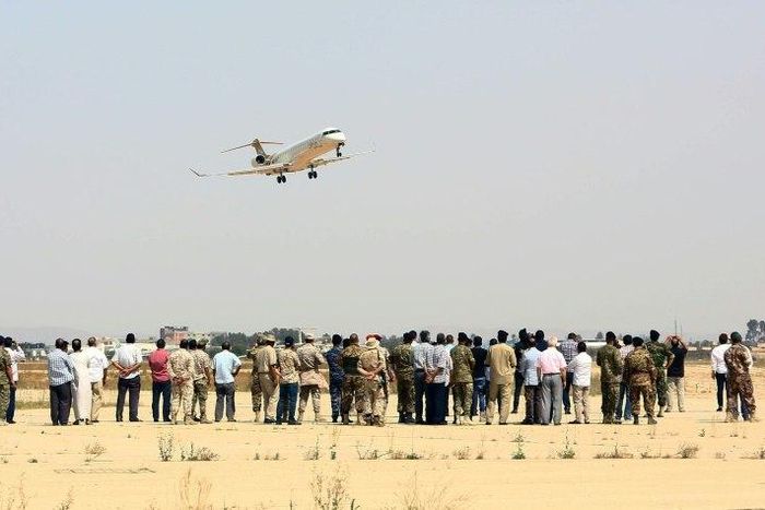 A Libyan Airlines aircraft flies over Tripoli International Airport, after forces belonging to the Libyan unity government took control of the facility on June 1, 2017