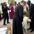 Pope Francis kneels to kiss the feet of South Sudan's President Salva Kiir